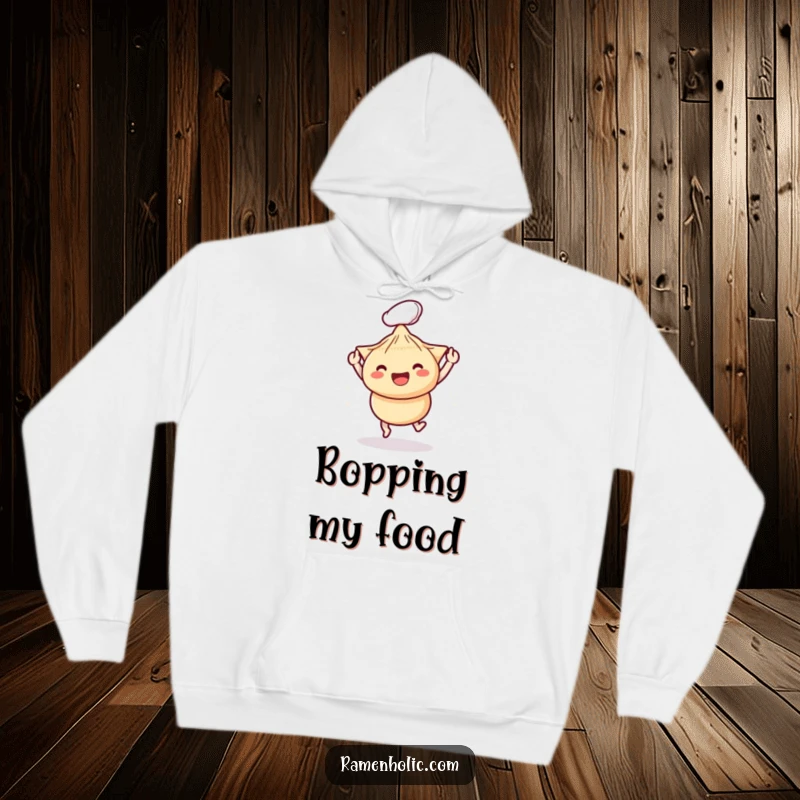 Funny hoodie depicting chopsticks playfully interacting with a happy dumpling, radiating warmth and a sense of fun dining.