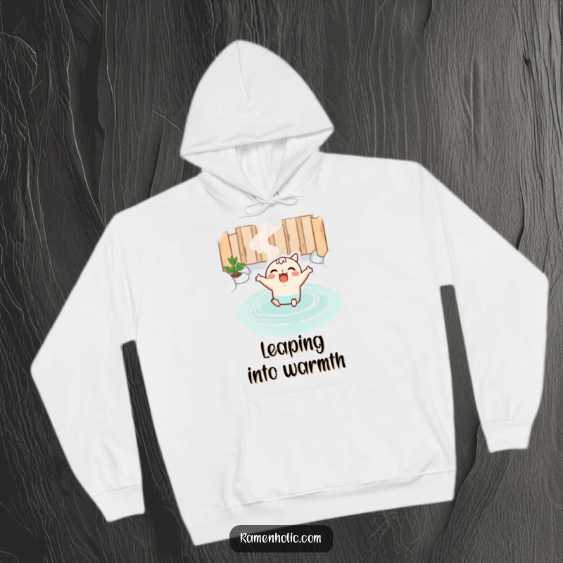 Funny hoodie featuring a kawaii miso soup character joyfully leaping into a steaming hot spring, designed for ultimate comfort and relaxation.